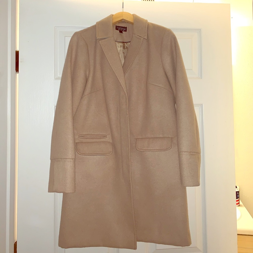 A camel coat from Topshop